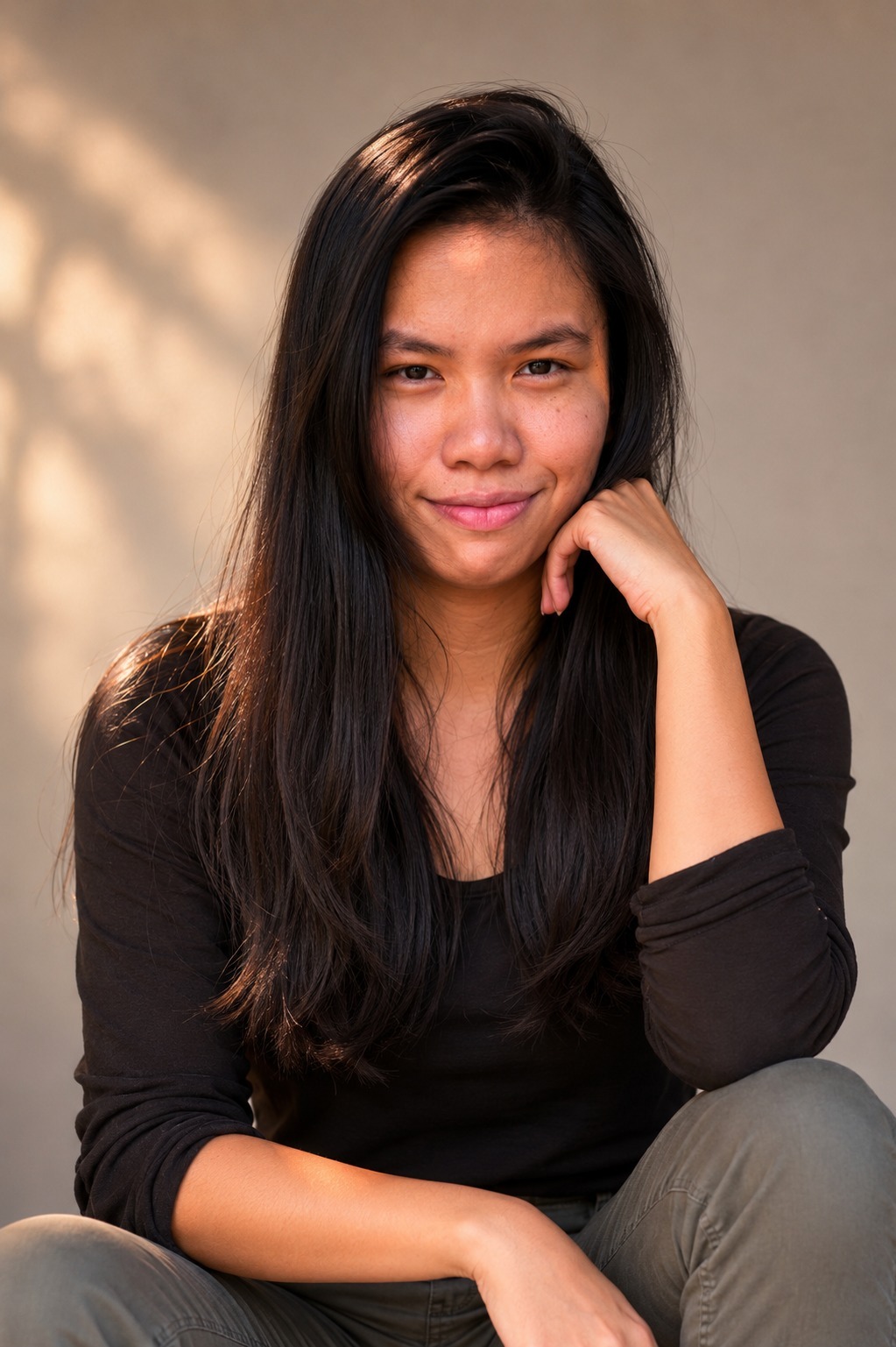 Vergielyn Cubol, copywriter and brand system strategist, seated portrait